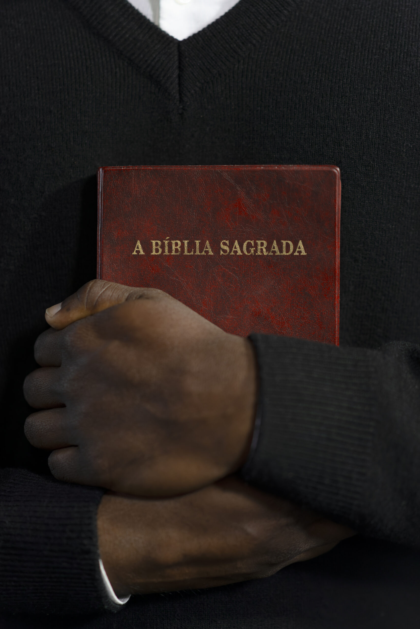 man-holding-bible-book-church
